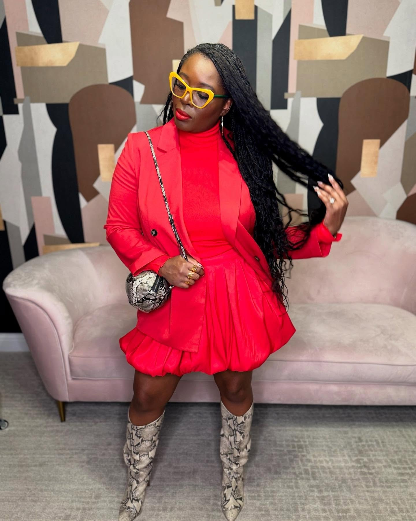 Taking the bubble skirt from brunch to a bold night out! 🌙✨ For date night, I elevated the look with a sleek turtleneck, a matching blazer for structure, and statement accessories. The real game-changer? These snake print boots & bag, adding texture and edge to the all-red moment. 🔥 Would you rock this look for a night out? 💃🏽❤️ 

#fashion #style #blackgirlmagic #datenight  #fashiontrends #BubbleSkirt #DayToNightFashion#falloutfit 

#LTKPlusSize #LTKSeasonal #LTKShoeCrush