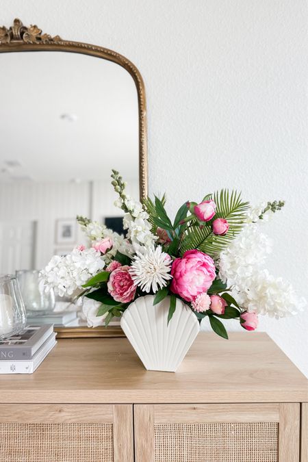 Coastal summer 🦩🤍🐚 #coastalhome #coastaldecor #florals #anthropologie #homedecor #florwers #mirror #console 

#LTKStyleTip #LTKHome #LTKFindsUnder50