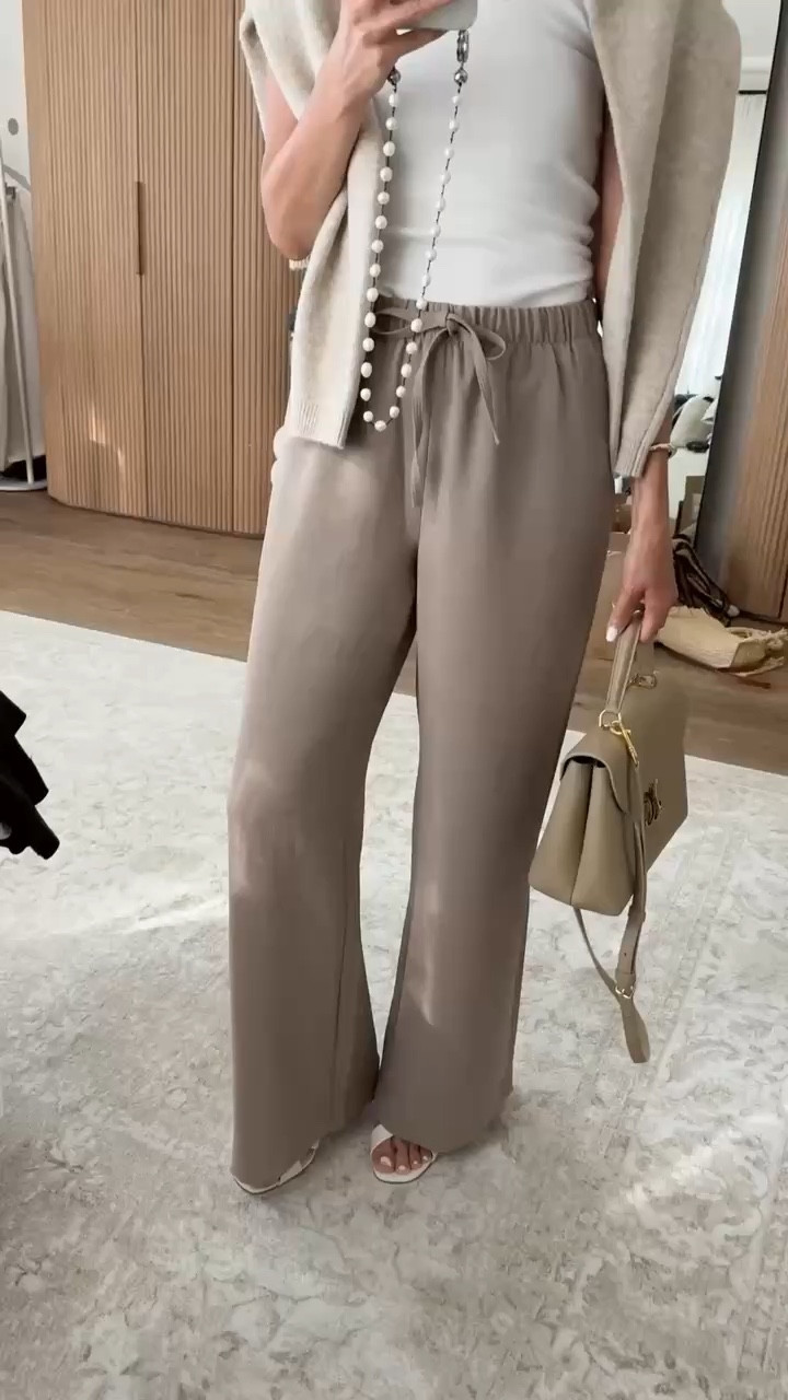 Styling the viral @Aritzia pants! I’m just shy of 5-7” wearing the size SMALL REGULAR pants in the color nomad taupe , small sweater and XS tank top. #stylinbyaylin #springoutfit #basics

#LTKootd #LTKOver40 #LTKgrwm