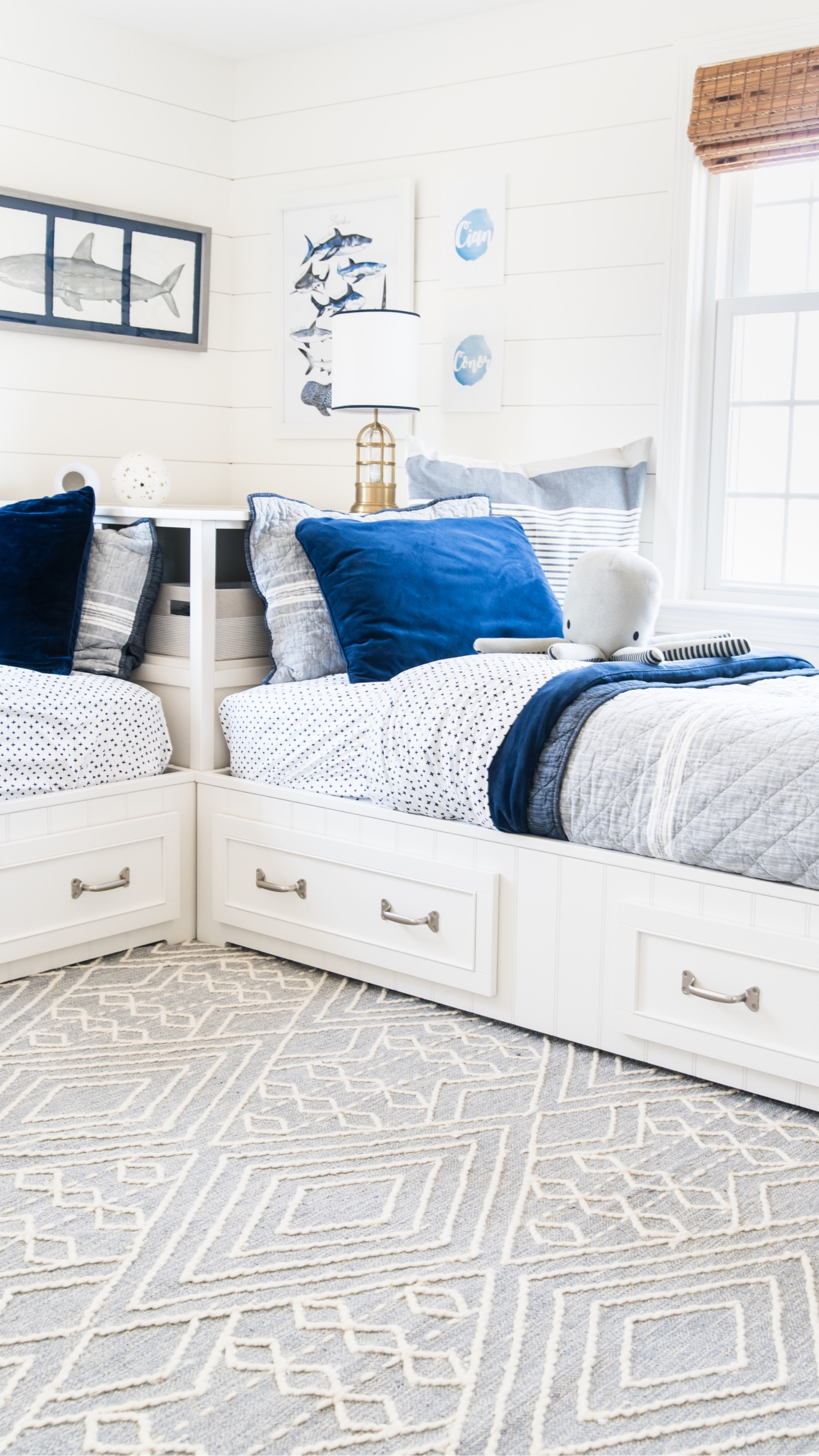 Boy bedroom decor. Pottery barn kids, kid bedroom decor ideas, corner bed, navy bedding, storage bed, shiplap, blue boys room, blue bedroom, coastal home, coastal finds, coastal bedroom 

#LTKhome #LTKfamily #LTKkids