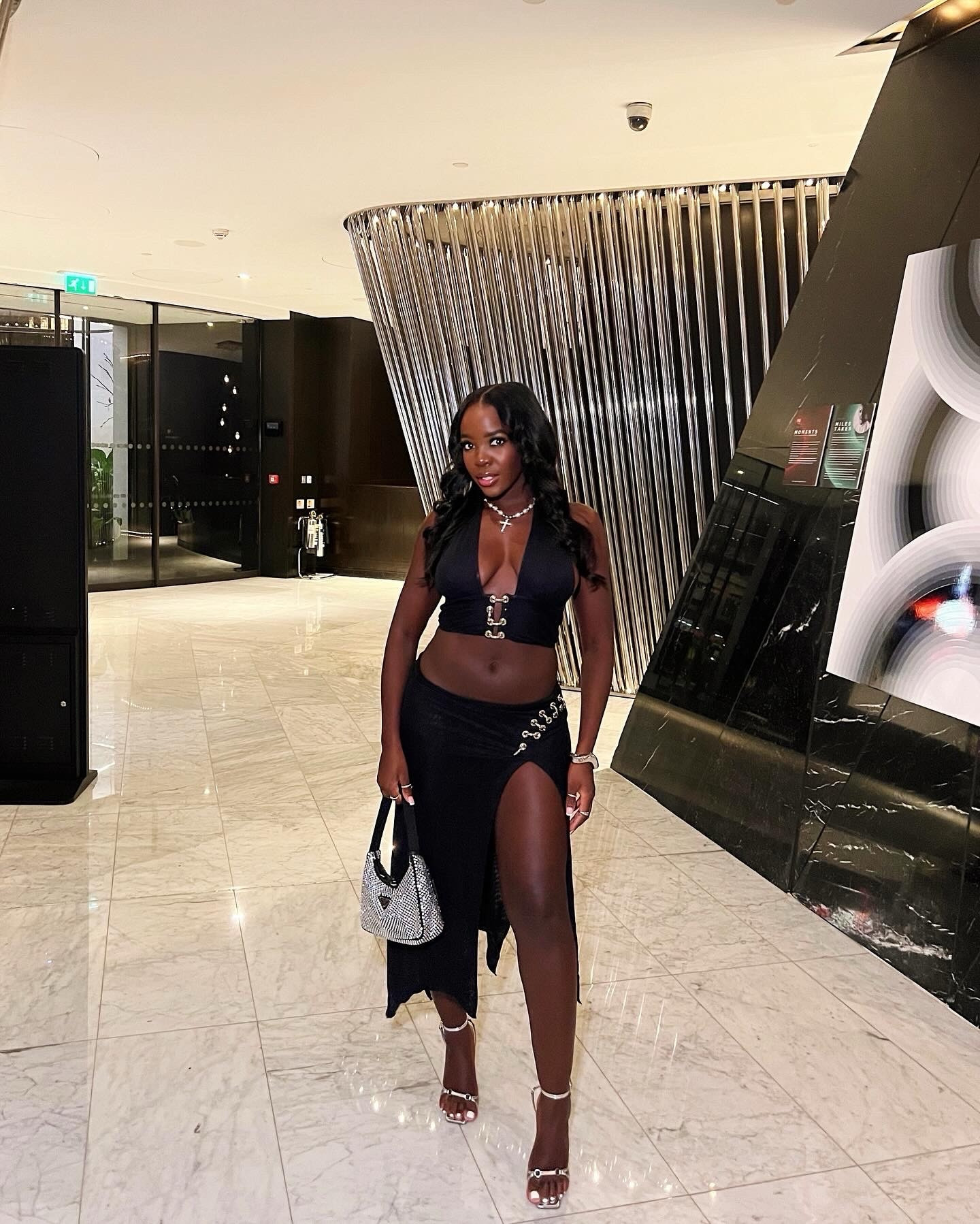 Black two piece, silver accessories, diamanté bag, Prada bag, ego necklace, cross necklace, black outfit, all black outfit, party outfit, girls night outfit, date night inspo 

#LTKeurope #LTKSeasonal #LTKstyletip