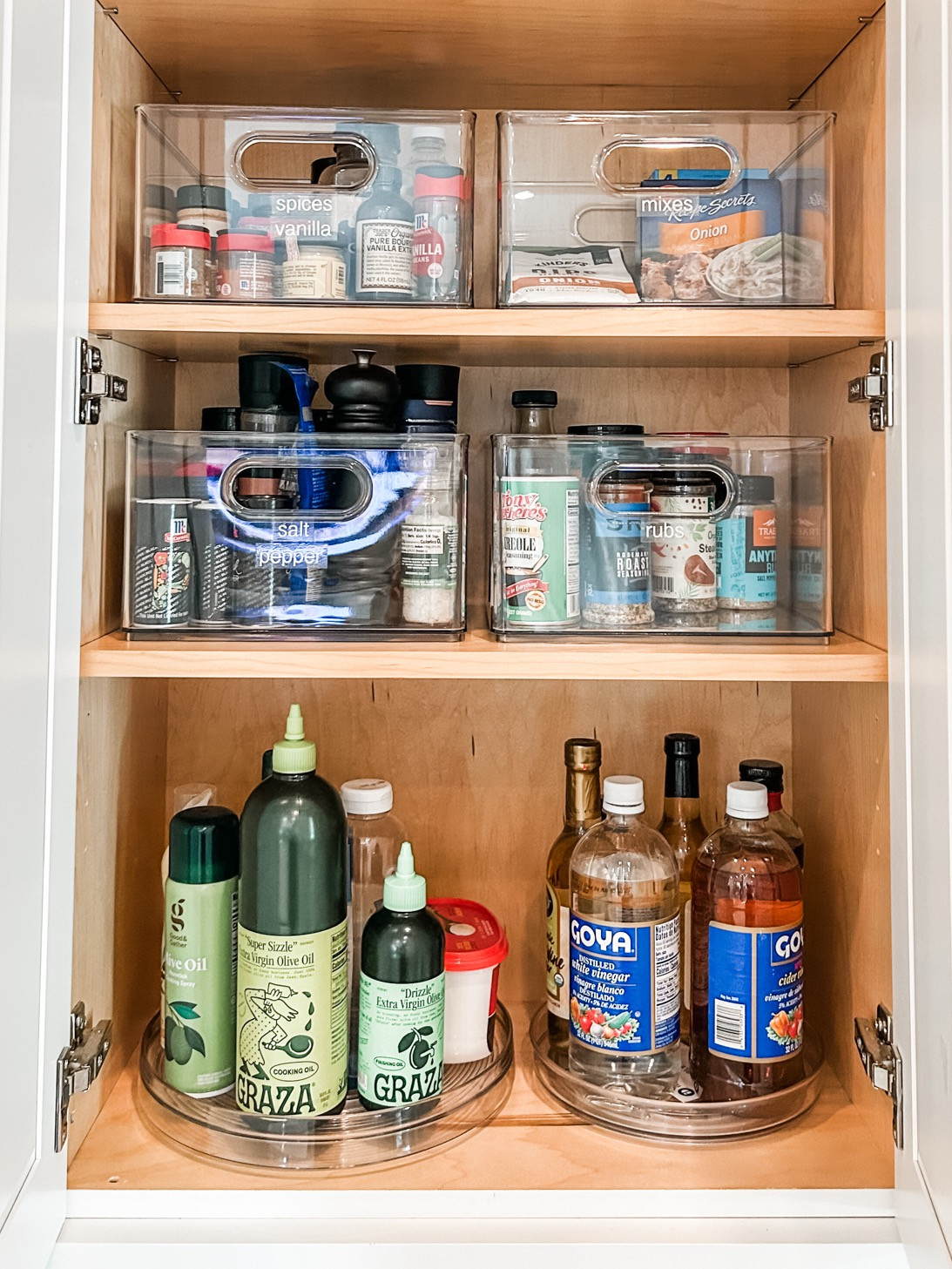 While our client has a glam spice drawer with matching jars & labels for all her go to's, having a spot for the less frequently used and overstock spices is just as important! 

 