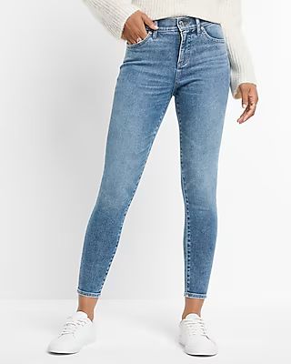 Mid Rise Medium Wash Back Zipper Hem Skinny Jeans | Express