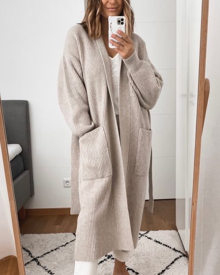 Cozy, long cardigan - runs big, wearing small.
Linked some alternatives as well.