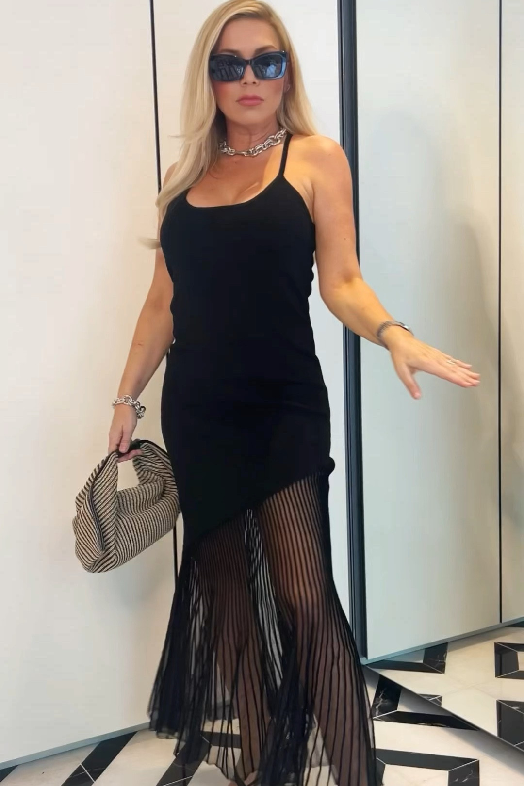 Resort or Wedding Guest Dress
Black Chelly Knitted Midi Dress with Sheer Hem Panel - This is a showstopper! Wearing a 4!

#LTKfindsunder100 #LTKwedding #LTKover40