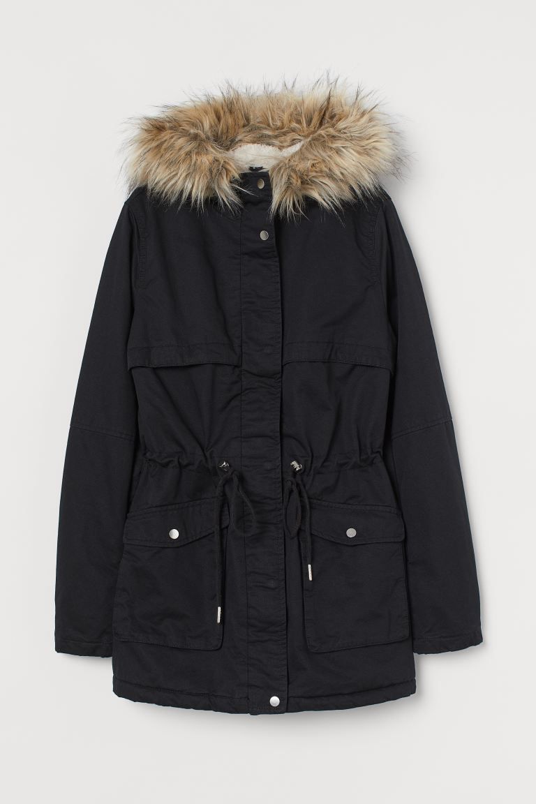 Short, faux shearling-lined parka in woven cotton fabric with a faux fur-trimmed hood. Stand up c... | H&M (US + CA)