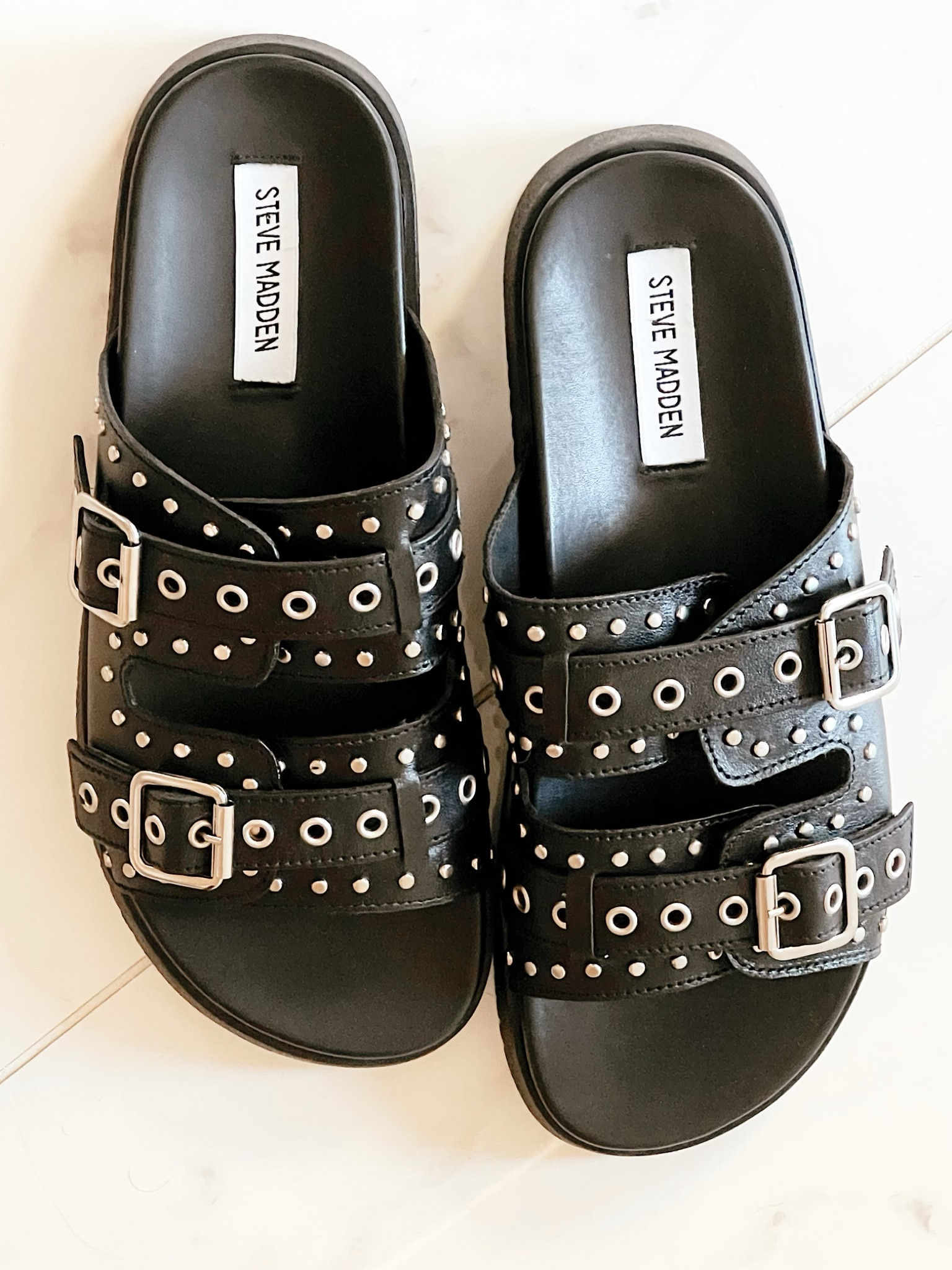 Designer look for less slides under $100

#LTKshoecrush #LTKfindsunder100