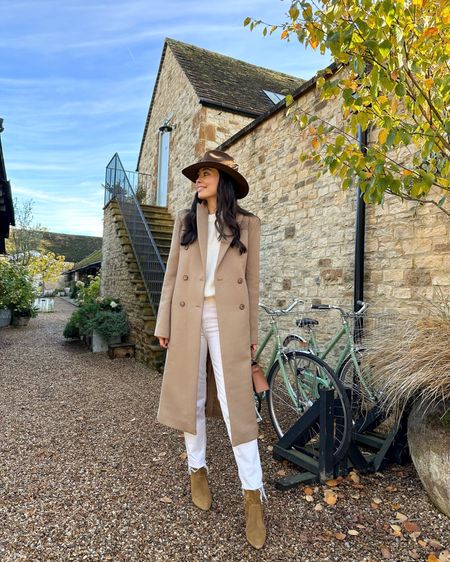 Kat Jamieson wears a fall outfit in the English countryside. Camel coat, double breasted coat, cream denim jeans, fall booties, suede. Hat is from Kemosabe in Aspen. 

#LTKSeasonal #LTKshoecrush #LTKeurope