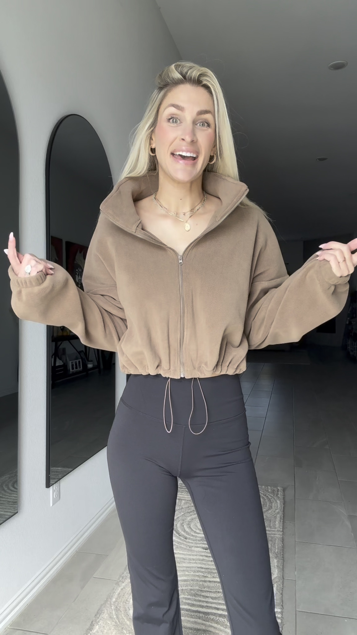 Okay, this brown sherpa jacket is giving cozy and cool. It’s a cropped 20-inch length with a full zip and stand collar, so you’re actually warm and bundled. The bungee hem? Obsessed — it keeps cold air out and gives that cute baggy shape. Super soft, super plush, and lightweight but warm. If you love a trendy cropped jacket that still does the job, this is it. Perfect for fall errands or layering on the go! 

 

#LTKgrwm #LTKSaleAlert #LTKTall