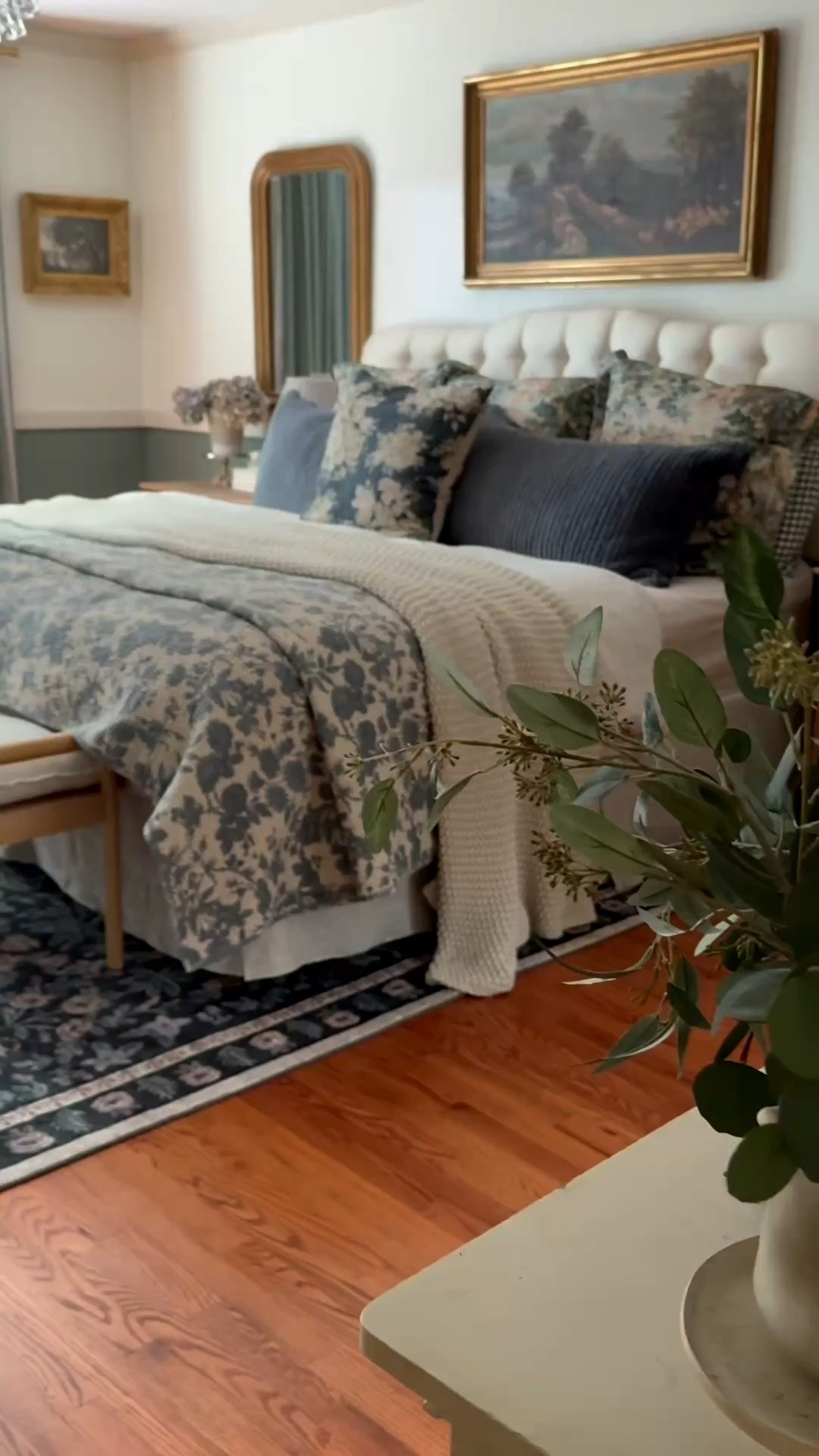 Cozy bedroom inspiration. Reversible blue floral quilt, chunky knit throw blanket, linen bedskirt, linen sheets, linen duvet set, velvet scallop reversible shells, toile percale shams, crystal chandelier, soft dark floral rug, custom linen curtains with border trim, arched gold mirror

#LTKHome #LTKSeasonal #LTKSaleAlert