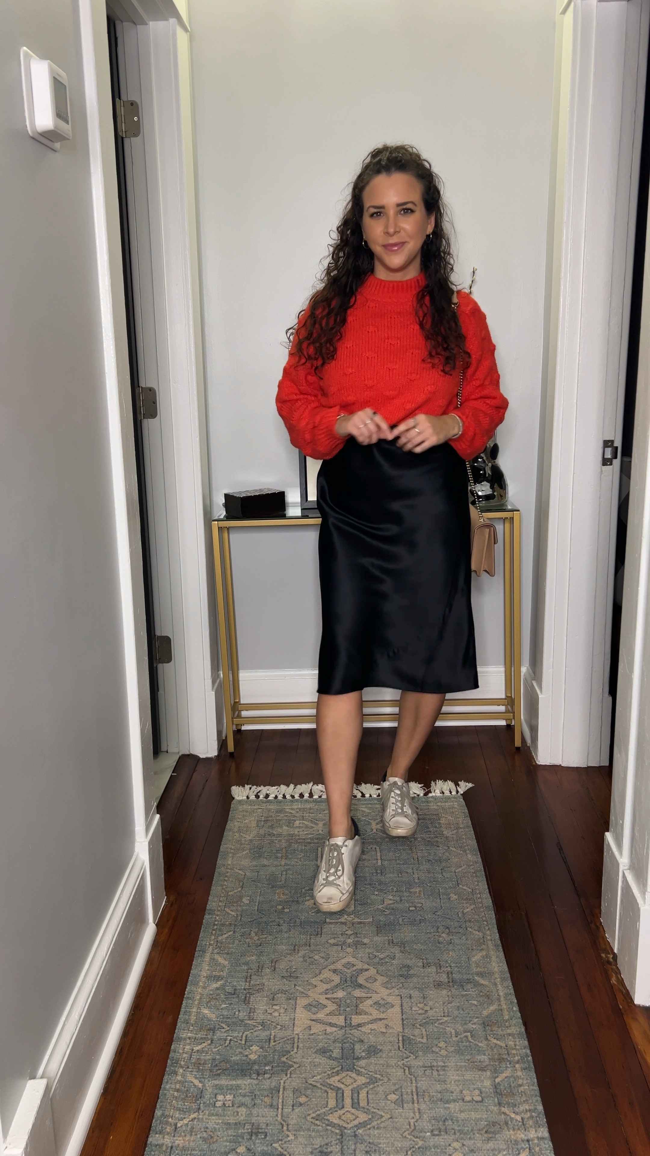 Red sweater. Black slip dress. Winter layers. Sweater over a slip dress.

#LTKSeasonal #LTKfindsunder100