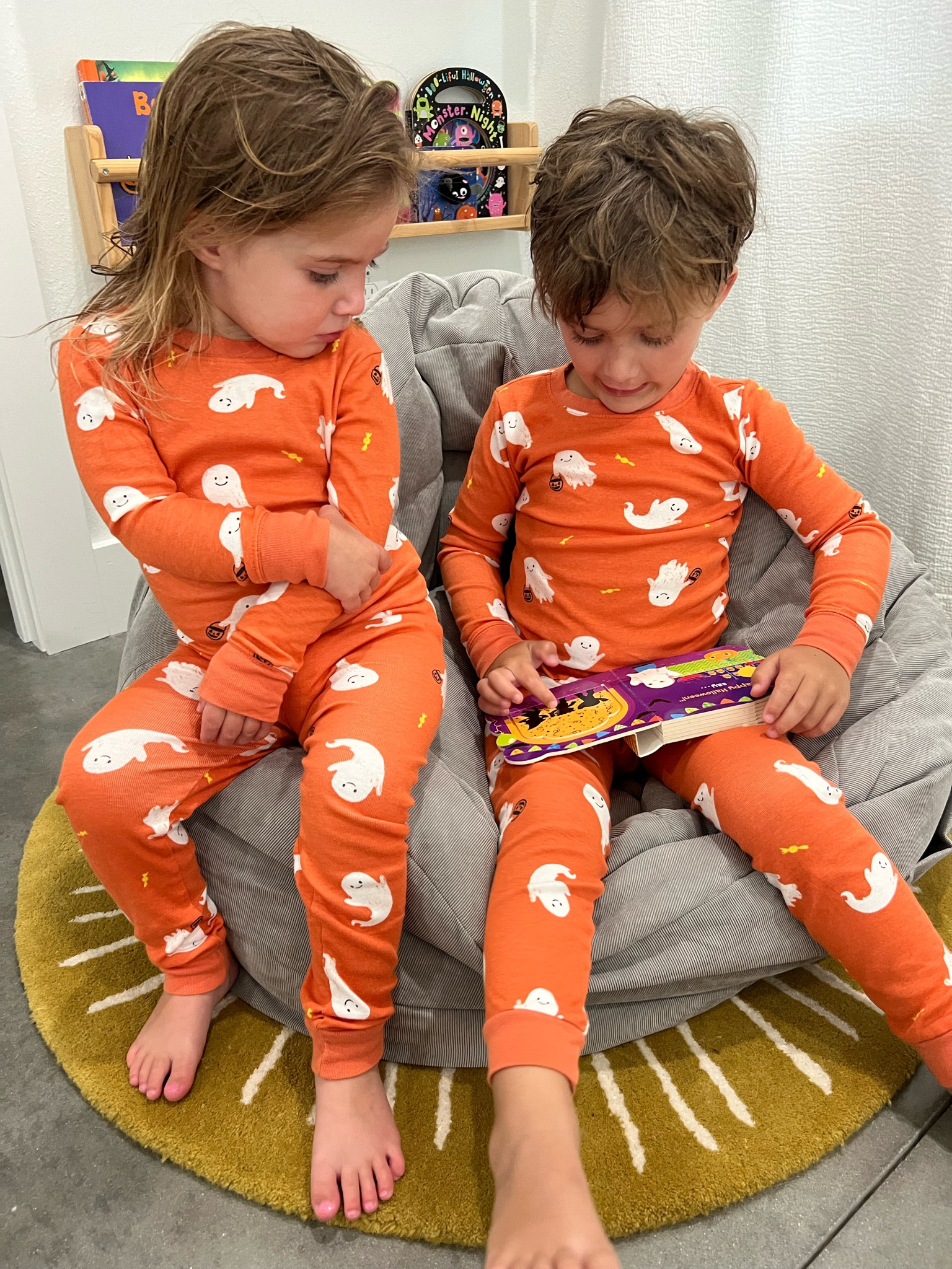 Big bro is trying to read his Halloween book to sis! 👻 These pjs are our fav! Grab yours before it’s too late! 

#LTKHoliday #LTKHalloween #LTKKids
