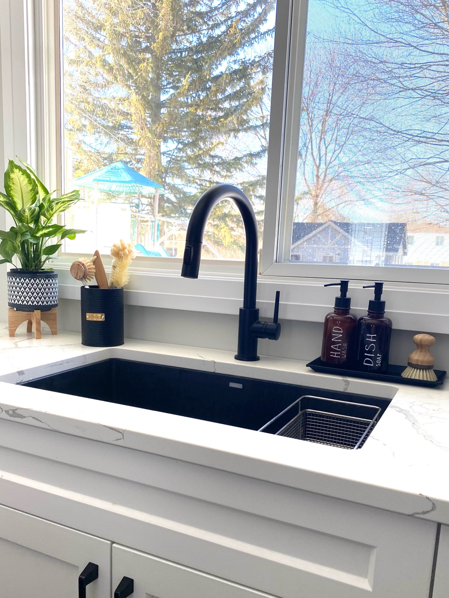 "Contrast and Elegance: The sleek black sink and faucet make a striking statement in our mostly white kitchen."

#LTKfamily #LTKhome #LTKSale