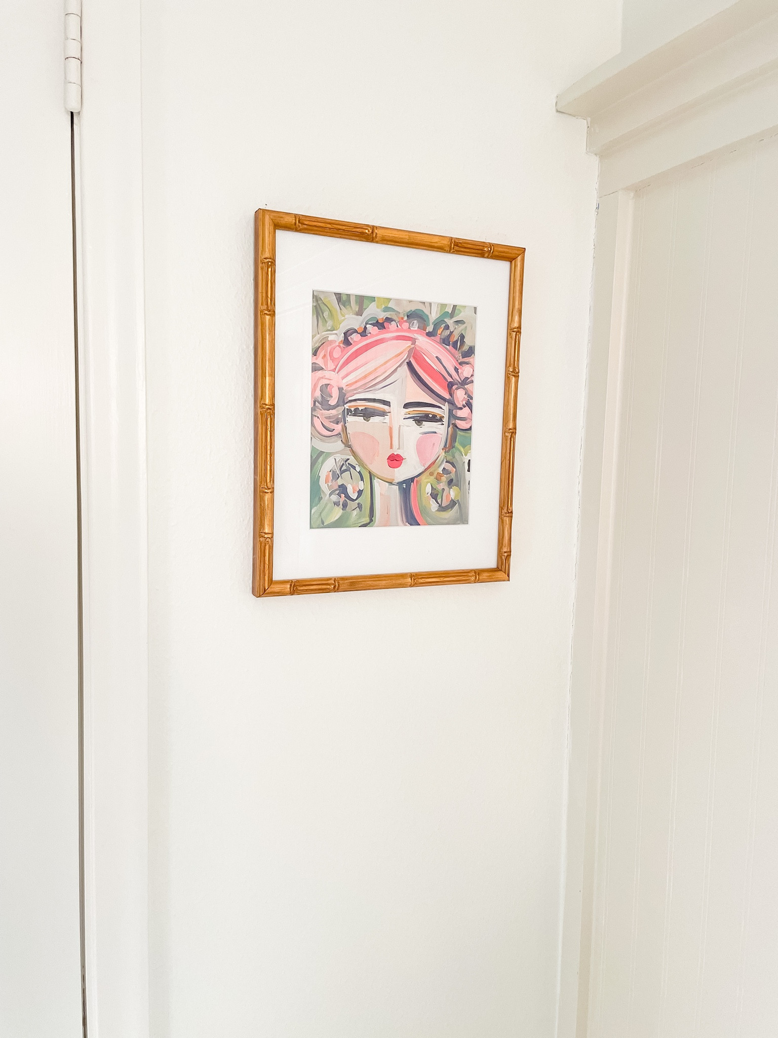 Art print is an 8x10 with an 11x14 mat board in an 11x14 faux bamboo frame  

Worrier girl print // Maren Devine Art // pink and green nursery // faux bamboo frame

#LTKhome #LTKbaby