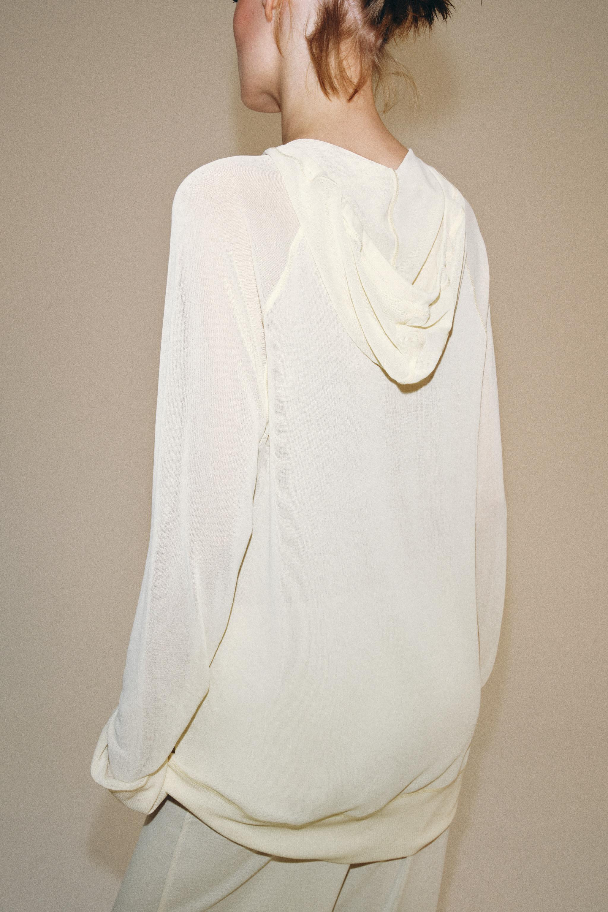 Model height: 176 cmSweatshirt crafted from semi-sheer fabric. Round neck with adjustable drawstr... | Zara UK