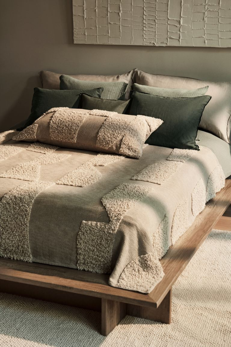 Housse de coussin en coton tufté | H&M (FR, IT, ES, PT, BE)