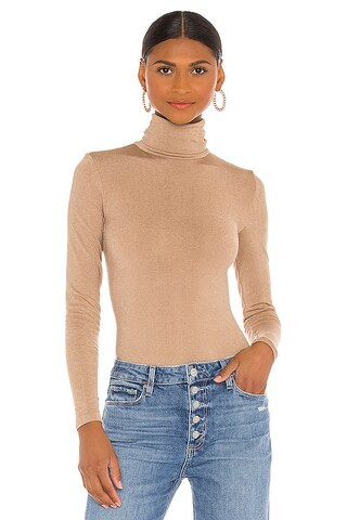 Colorado String Bodysuit
                    
                    Wolford | Revolve Clothing (Global)