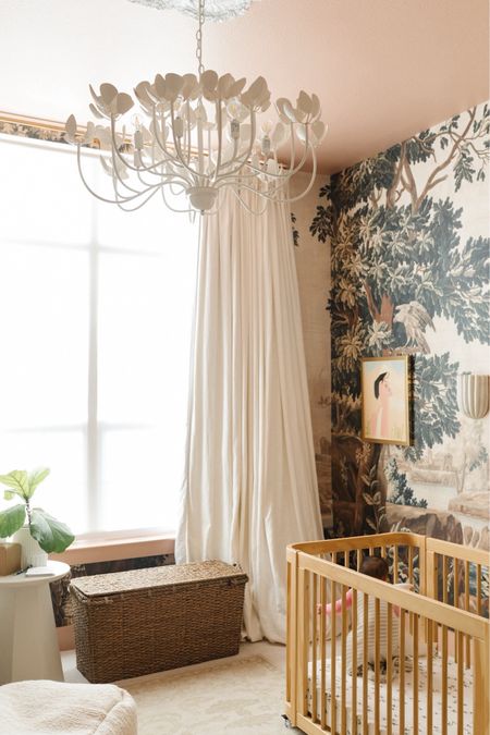 Daughters nursery with mural wallpaper, light pink paint, oak crib and more. Love the spring look! 

#LTKbaby #LTKstyletip #LTKhome