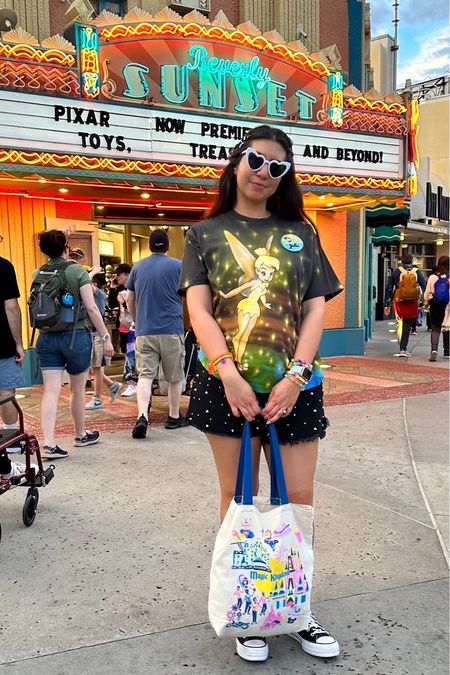 Outfit of the day for Disney World! We went to Magic Kingdom and Hollywood Studios. My green bag is inside my new Magic Kingdom tote. I loved this whole outfit! Tinkerbell is my favorite! #disney #disneyoutfit #disneyworld #disneyworldoutfit #disneybound #nordstrom #magickingdom 