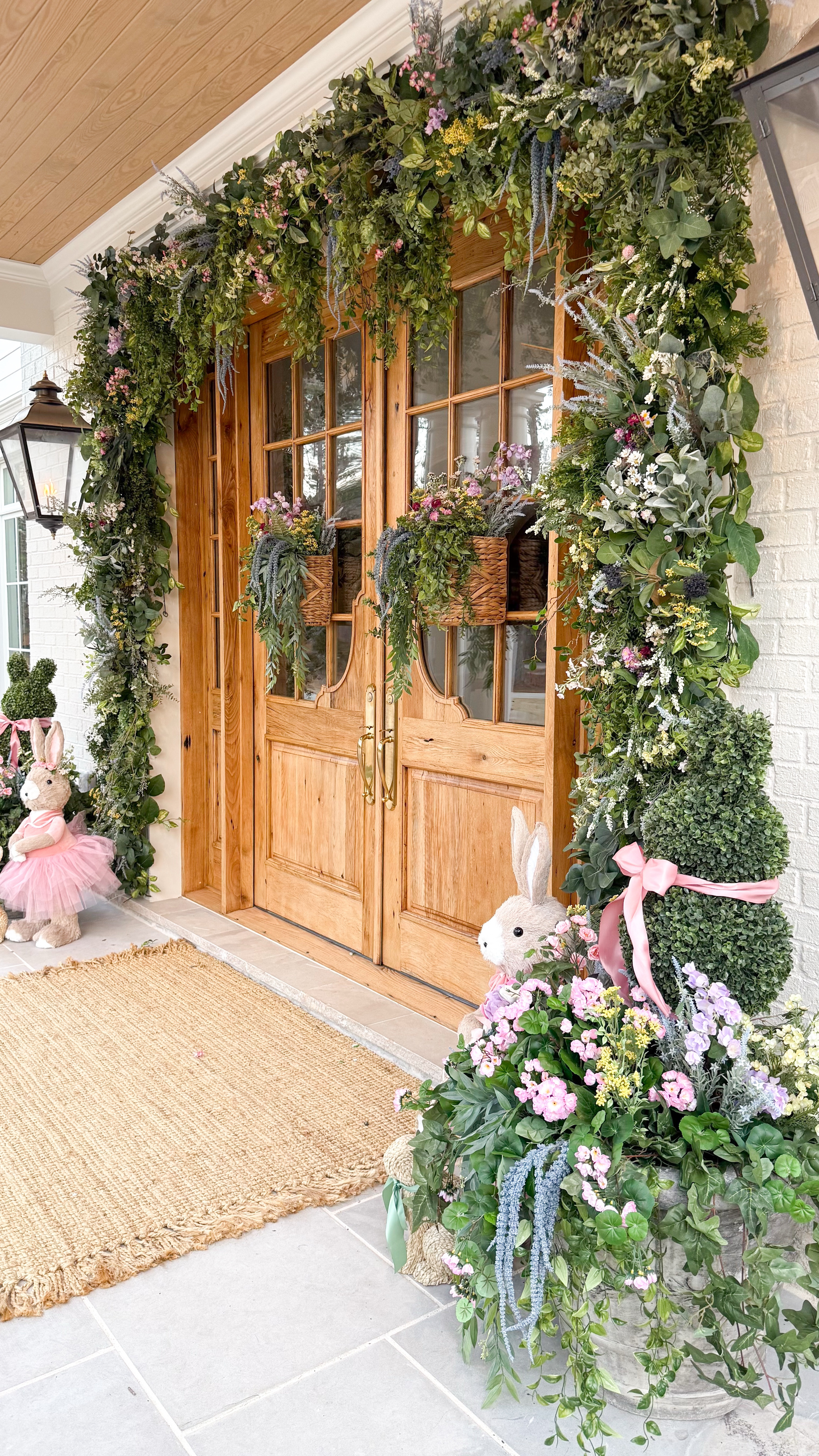 Front door spring basket hangers 

#LTKSeasonal #LTKWatchNow #LTKHome