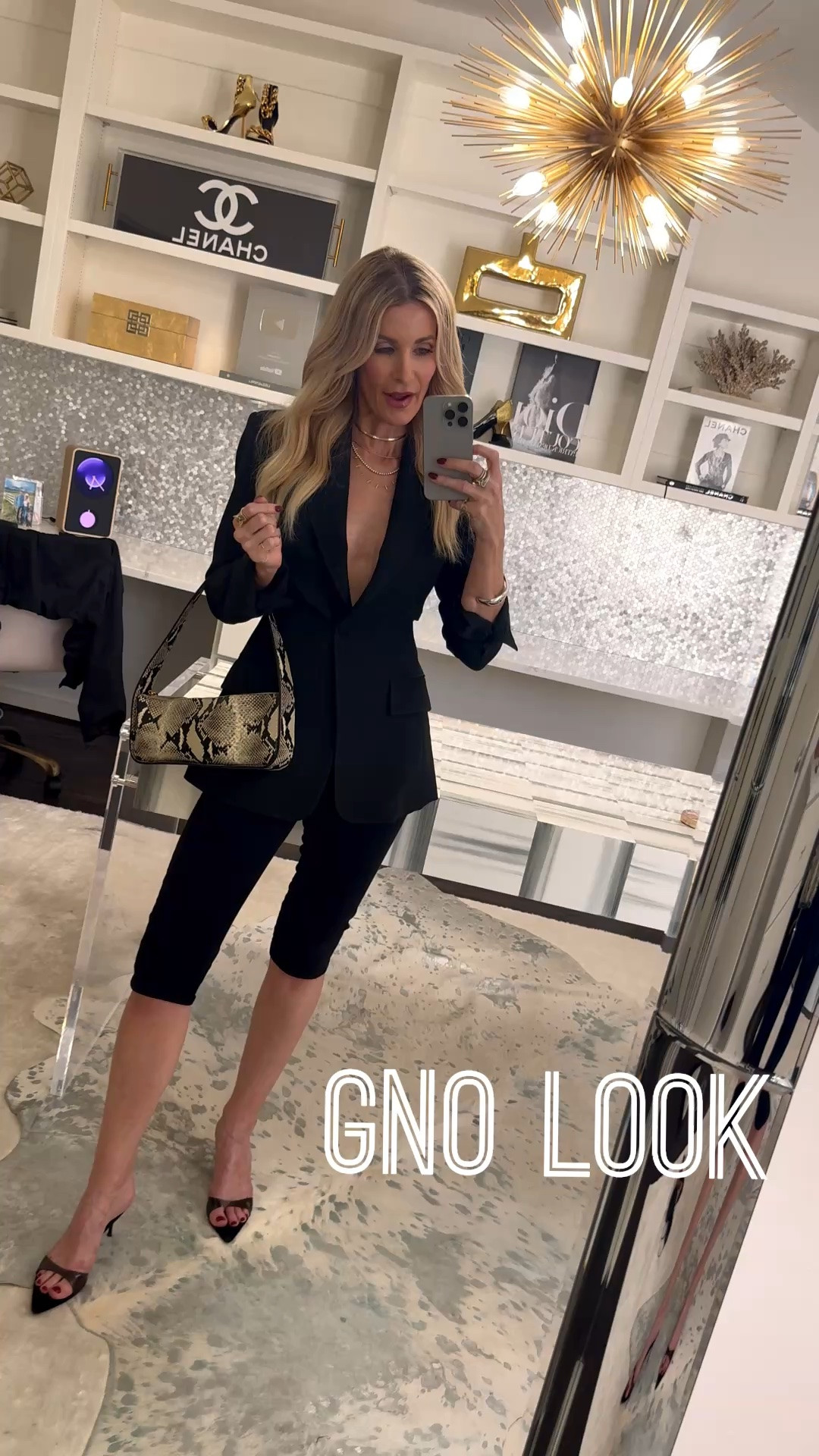 Girls’ night calls for a little edge.

This blazer is the whole outfit. Those cutout sides give it just enough attitude without trying too hard — paired it with my black capris and the black-and-clear kitten heels I have literally not taken off in weeks.

It’s giving “I made an effort” while actually taking me ten minutes to put together. That’s the whole goal at this point in my life.

Blazer + capris: true to size, I’m in an XS in both
Heels: the ones you’ll see in every other Reel of mine lately.

#LTKgrwm #LTKootd #LTKOver40