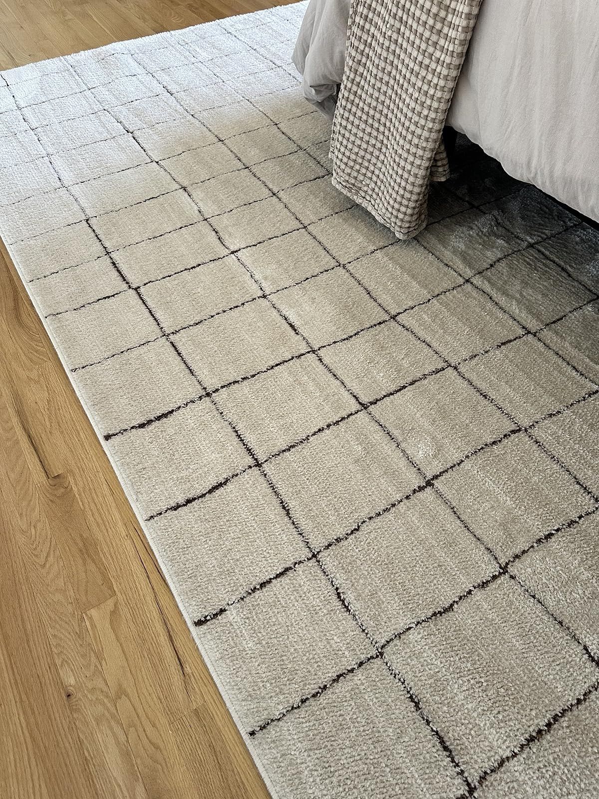 Love our new bedroom rug! This is Our PNW Home x Surya collab Cascade collection. It’s a beautiful ivory rug with brown striping. Super soft, modern, organic decor. | Amazon (US)