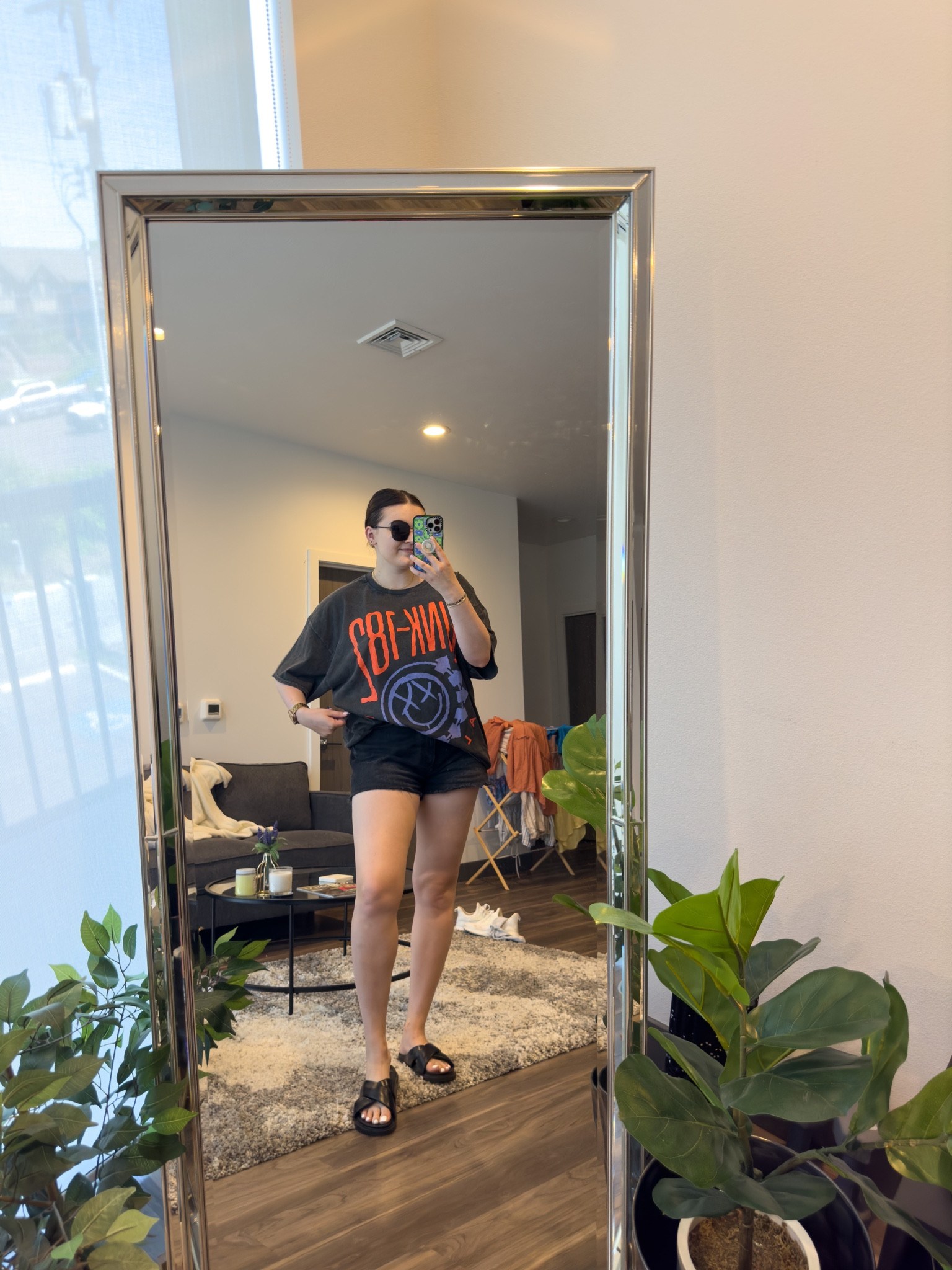 Casual summer outfit idea for edgy girls! Featuring a new band tee from Urban Outfitters. 

I’m wearing a L/XL tee, size 31 shorts and size 9 sandals 

#LTKstyletip #LTKunder100 #LTKSeasonal