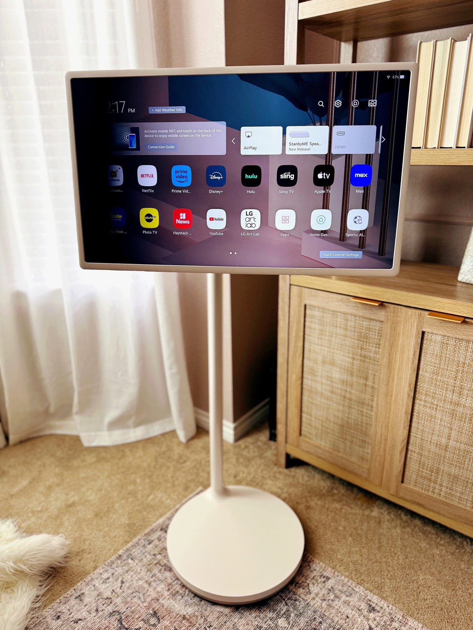 I waited a year+ to buy the portable touchscreen LG tv—and now I use it EVERY SINGLE DAY!! 🚨🔥BEST EVER PRICE I'VE SEEN AT $3OO OFF!! This is a splurge but it’s so convenient! You can move it everywhere, as it has wheels for smooth transitions from room to room. I will mirror my phone to this and flip it vertical to use in the kitchen with recipes I want to make—I use the remote and touchscreen, but I prefer the remote! It adjusts very easily up and down. I use it for workouts, my daughter loooooooved using it for a sleepover party she had and I use it a LOT to binge my shows while everyone else is watching football! Ha! Picture and sound is great, very easy to set up and use your favorite apps! HIGHLY recommend!!!   

#LTKSaleAlert #LTKHome #LTKGiftGuide