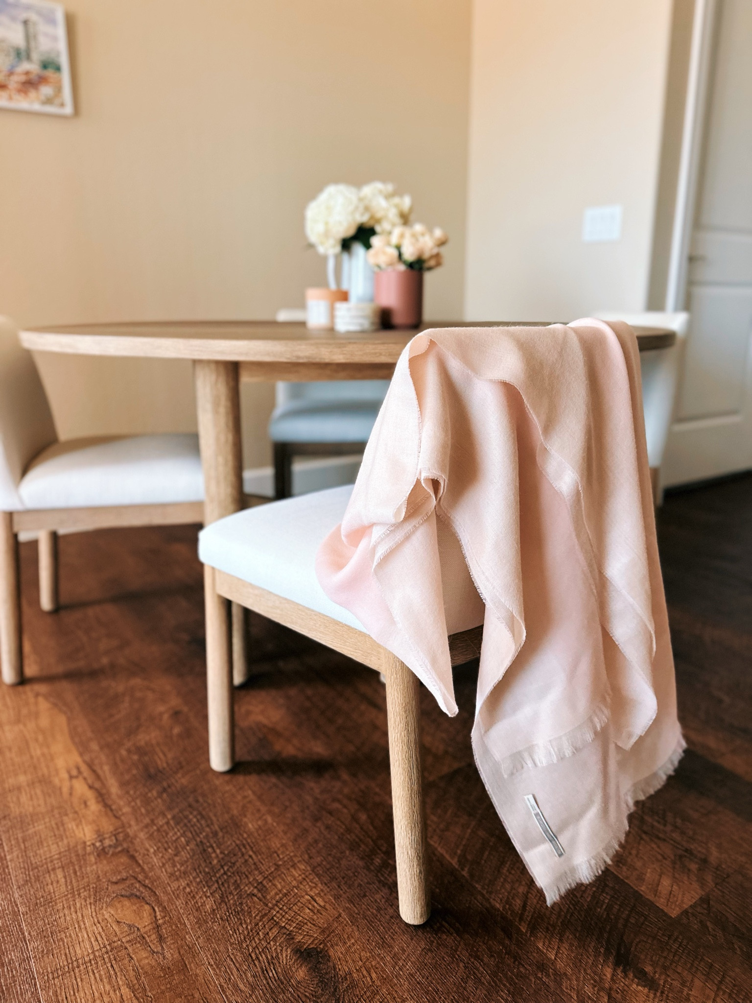 Little home details ✨ this wrap has been my go-to layering piece while working from home! And I can’t help but admire how pretty it looks hanging over our dining chairs 😍

#LTKHome