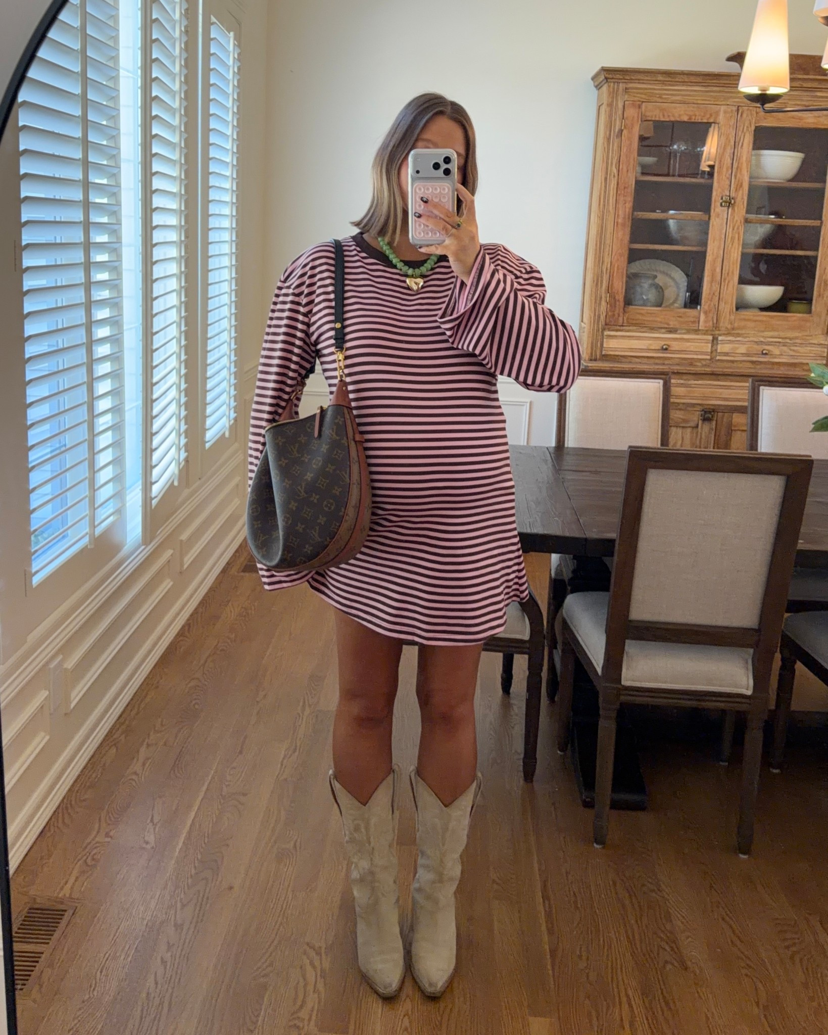Dress size 10 I’m 5’ 5” and it’s such a perfect length!! If I wasn’t pregnant I would do an 8. Stick with true size. Boots true to size probably my most worn cowboy boots ever!! Amazon necklace for a pop of color 

#pregnancystyle #bumpstyle #stripeddress #bresheppard #princesspolly 