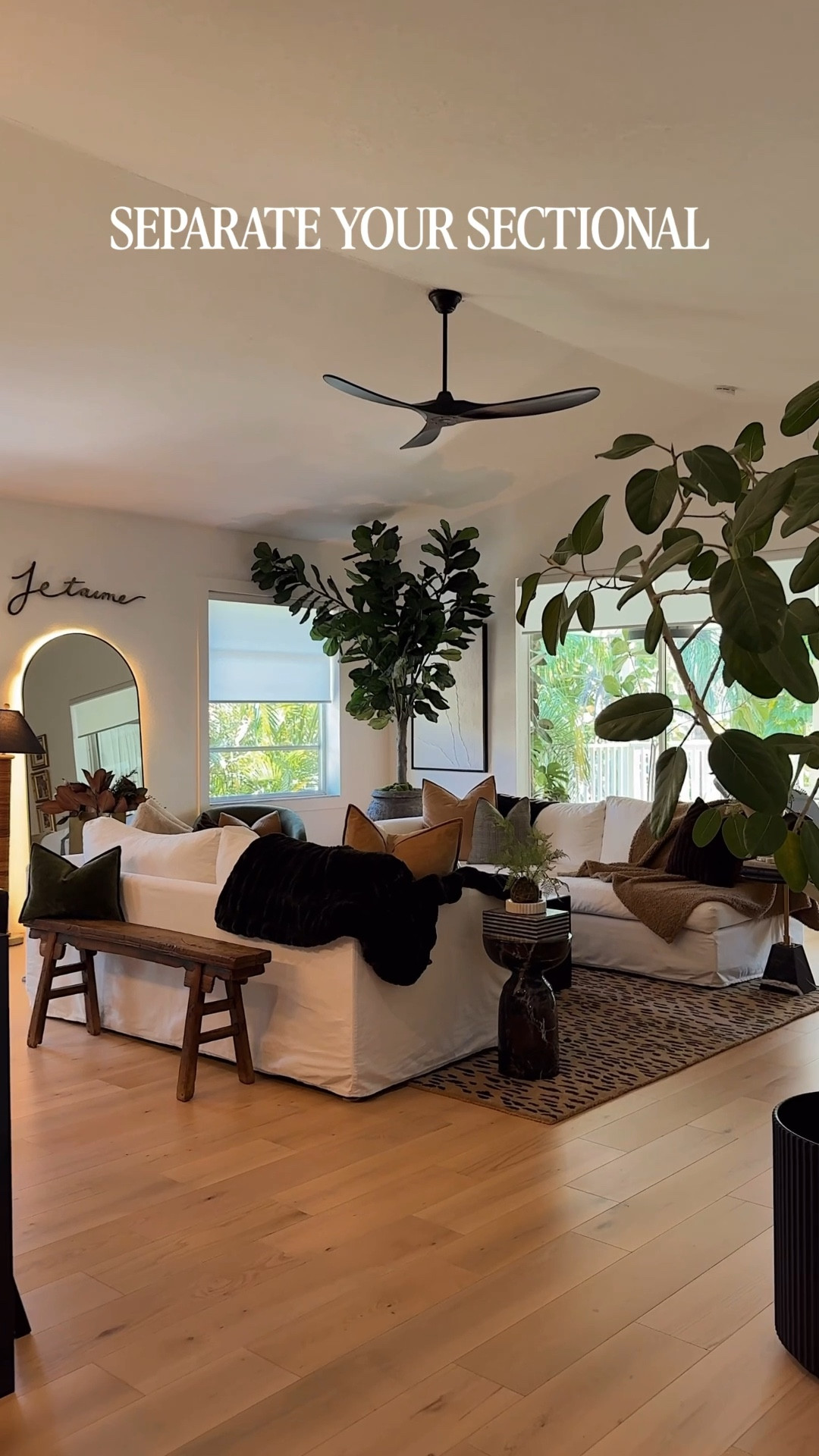 Living room decor. The faux fiddle leaf is 10’ tall. 

Neutral living room. Animal print rug, animal print decor. #meandmrjones 

#LTKstorytime #LTKSeasonal #LTKHome
