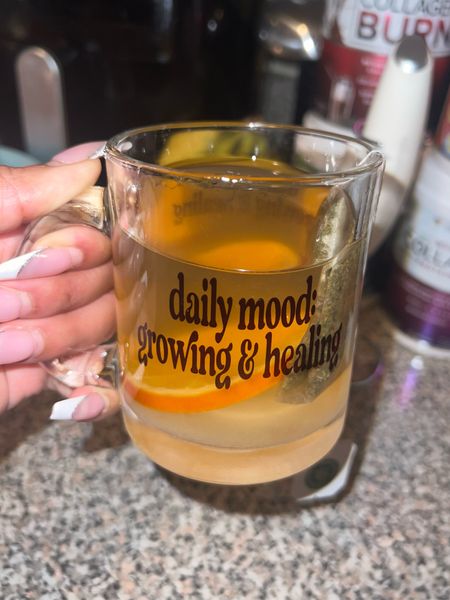 My Vitamin C Dussé Hot Toddy for the cold/flu season 🥃 🍊 

Perfect for soothing a sore throat,body comfort and a night cap to sleep well for healing  

Boil hot water
Add tea bag 
Rim glass with honey 
Drop in an orange slice 
Generous Splash of Dussé

Enjoy 😌

#LTKplussize #LTKSeasonal