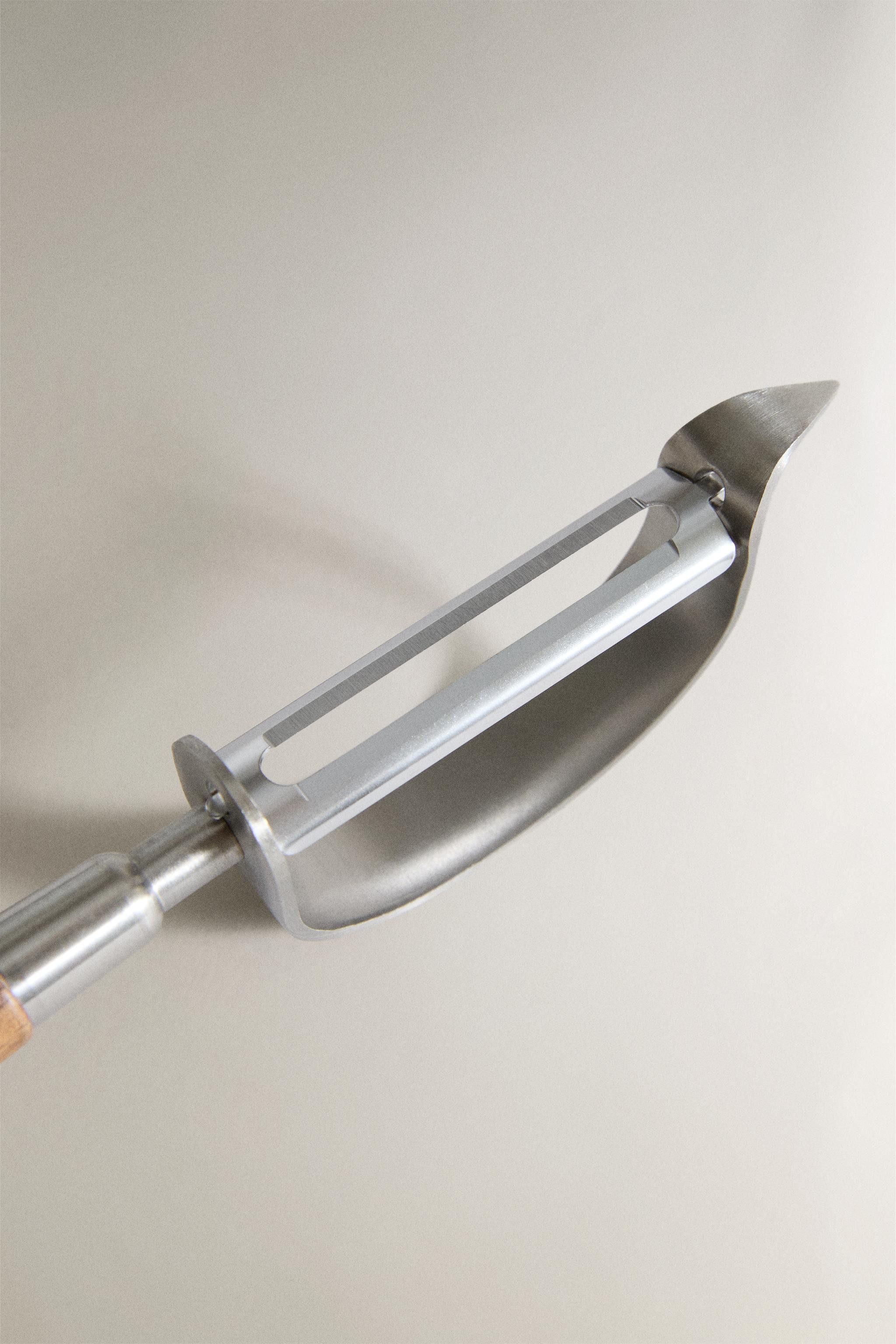 STEEL AND ACACIA PEELER | Zara US