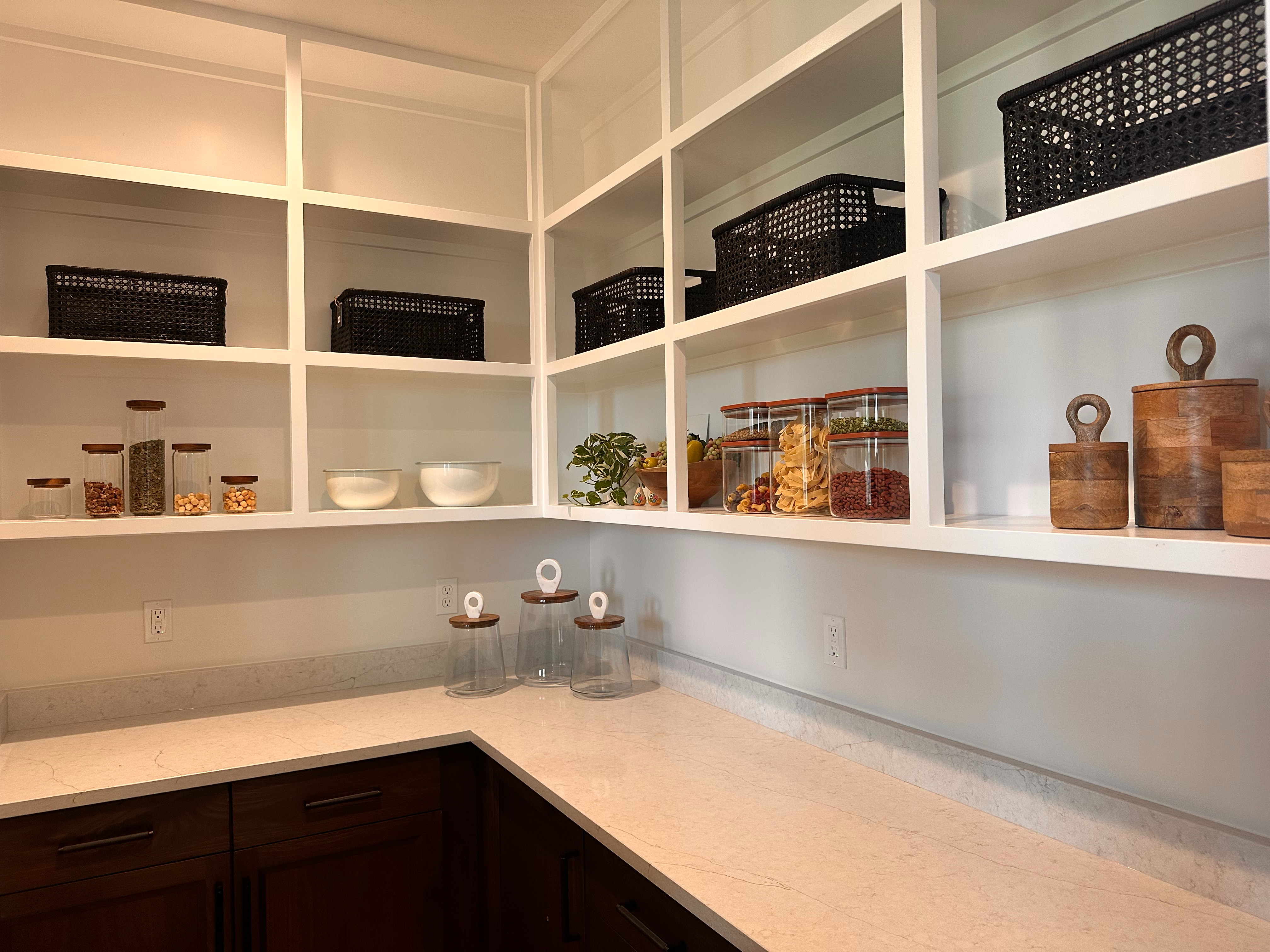 
Simple. Clean. Classy.
This pantry is minimal and beautiful — only the essentials on display, with food stored neatly behind cabinet doors.
We love the open space and the clutter-free look. 
#Pantryorganization #organizewithtracy#organizesimply 

 #LTKHome #LTKFamily