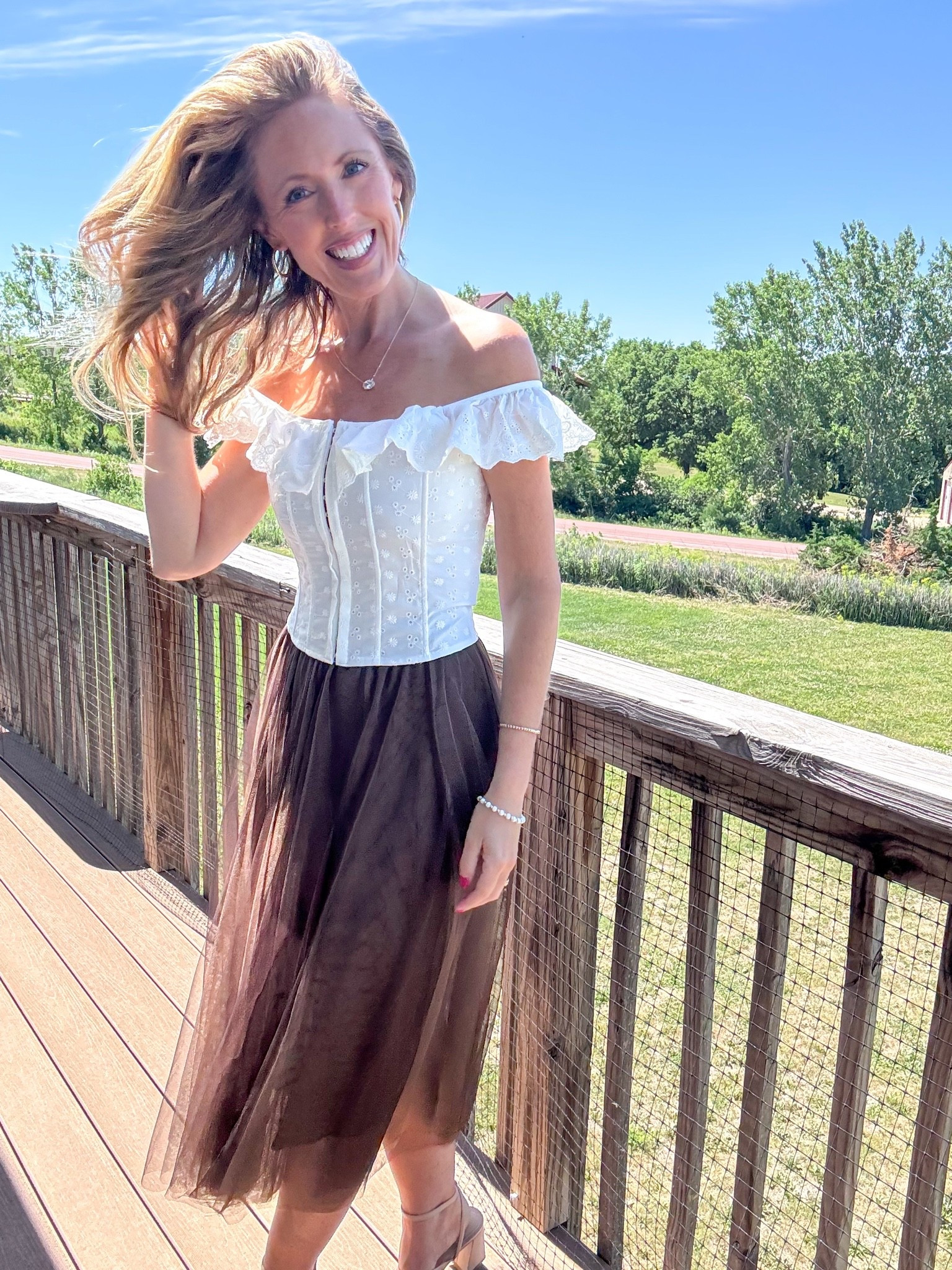 Obsessing over this beautiful off the shoulder white corset top and it pairs beautifully with this brown skirt! Wearing a small in both.

Brown tulle skirt, white corset top, spring styles, mom style, spring fashion 2026, spring outfit ideas, wedding guest outfit inspo, unique fashion ideas

#LTKOver40 #LTKMidsize #LTKmomlife