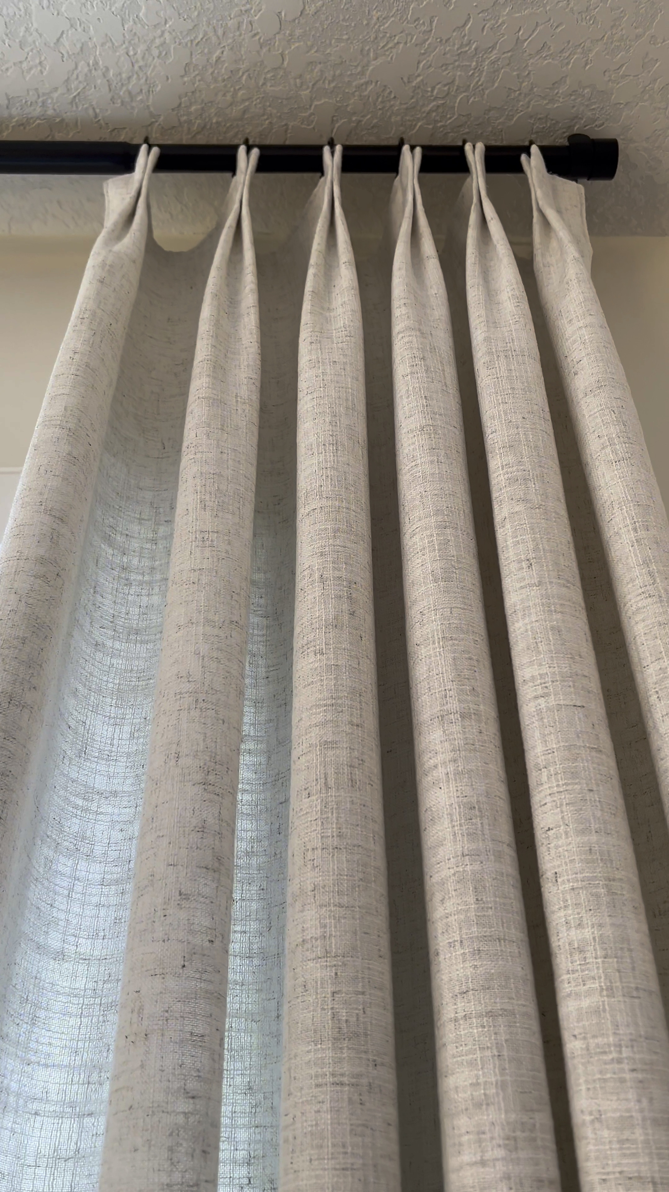 🥳
Here’s another custom drapery look for less with the most stunning fabric!! 🥰…. 

These drapes come ready to hang…. I didn’t need to stream them! 🎉…. and they come perfectly trained 😆🥳😆 

I hung the brackets on the wall about half an inch from the ceiling to give enough room for the curtain rod to slide into. 

I got 106 inch drapes and my ceiling is 9 feet. With this system my drapes perfectly kiss the floor, which is the look I’m going for. ☺️

The white hooks are adjustable and come with the drapes 🎉… do keep in mind they’ll only adjust your drapes upwards so if you’re going for a pool look, you’ll need longer drapes 💕

I can’t get over stunning the fabric is🥰…. It comes in 15 colors which you can get samples🥳 .. Hope you’ll love them as much as I do! 


#LTKStyleTip #LTKSaleAlert #LTKHome