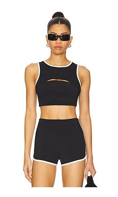 YEAR OF OURS Two Tone Cut Out Sports Bra in Black & White from Revolve.com | Revolve Clothing (Global)
