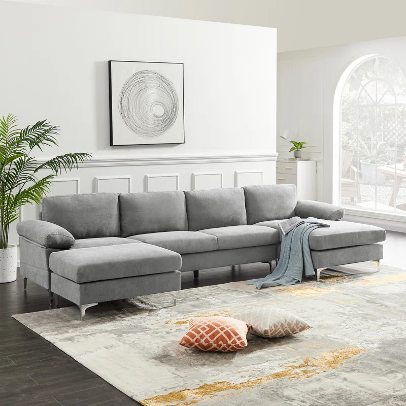 Gariepy 131" Symmetrical Sofa and Chaise with Ottoman | Wayfair North America