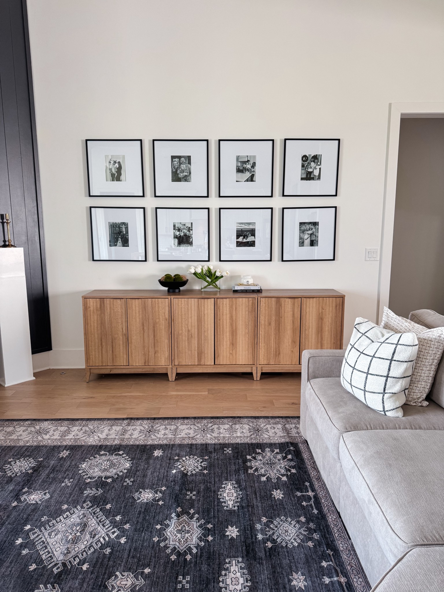 Washable charcoal, iron ore, 8x10 living room rug, black matted picture frame gallery wall, wood media console, natural wood sideboard, living room credenza, entryway table, wooden cabinet, armoire,buffet table decor, console table decor, modern farmhouse living room, glass vase spring tulip flower, black decor bowl, moss balls decorative bowl filler 

#livingroom #rug 

#LTKHome