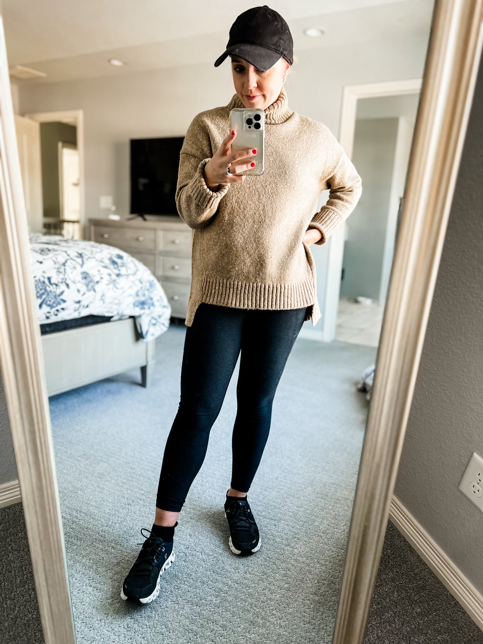 Sized down in this tunic sweater to xs. I love that it has coverage in the back. 40% off. Black leggings fit tts. Winter outfit. Winter sweater. Mock neck sweater. Tan sweater. Tunic sweater. 

#LTKSeasonal #LTKsalealert