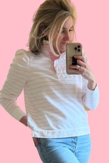 This is the perfect sweatshirt for going into spring, light and a stripe of blush! Only $25!

#LTKSale