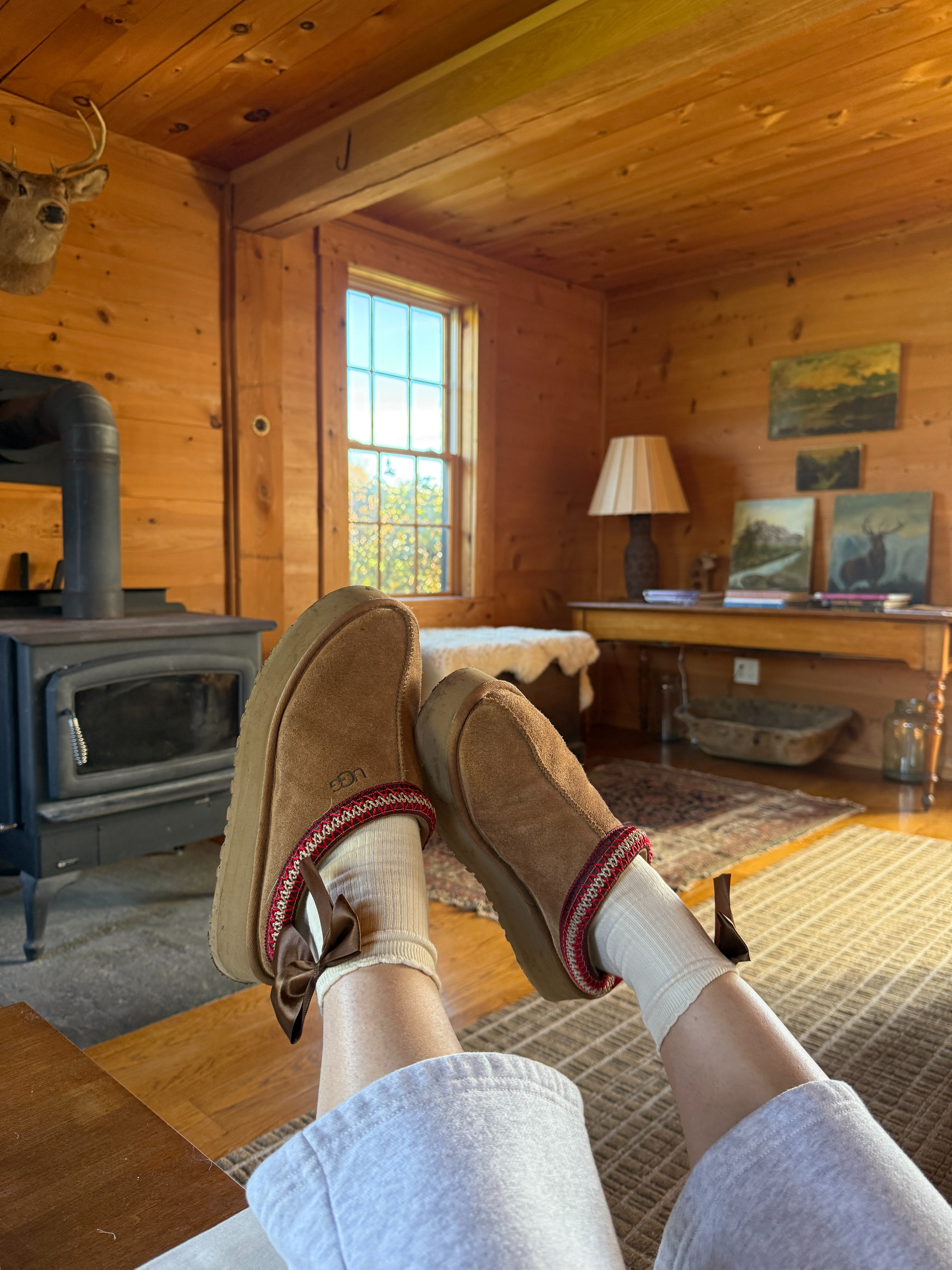 ugg tazz 
aerie bow socks 

 #LTKSeasonal #LTKFindsUnder50 #LTKShoeCrush