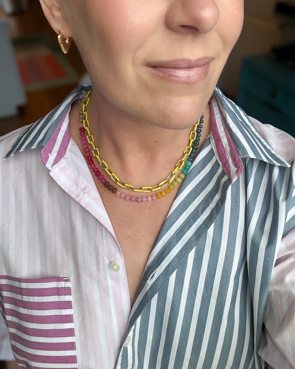 Had to share this colorful striped shirt that I’m loving, as well as some of my favorite jewelry pieces to wear with it. The shirt is an oversized fit, which makes it very comfy! It’s on super sale right now, and so are my colorful necklaces and my heart earrings.

#LTKMidsize #LTKSaleAlert #LTKOver40
