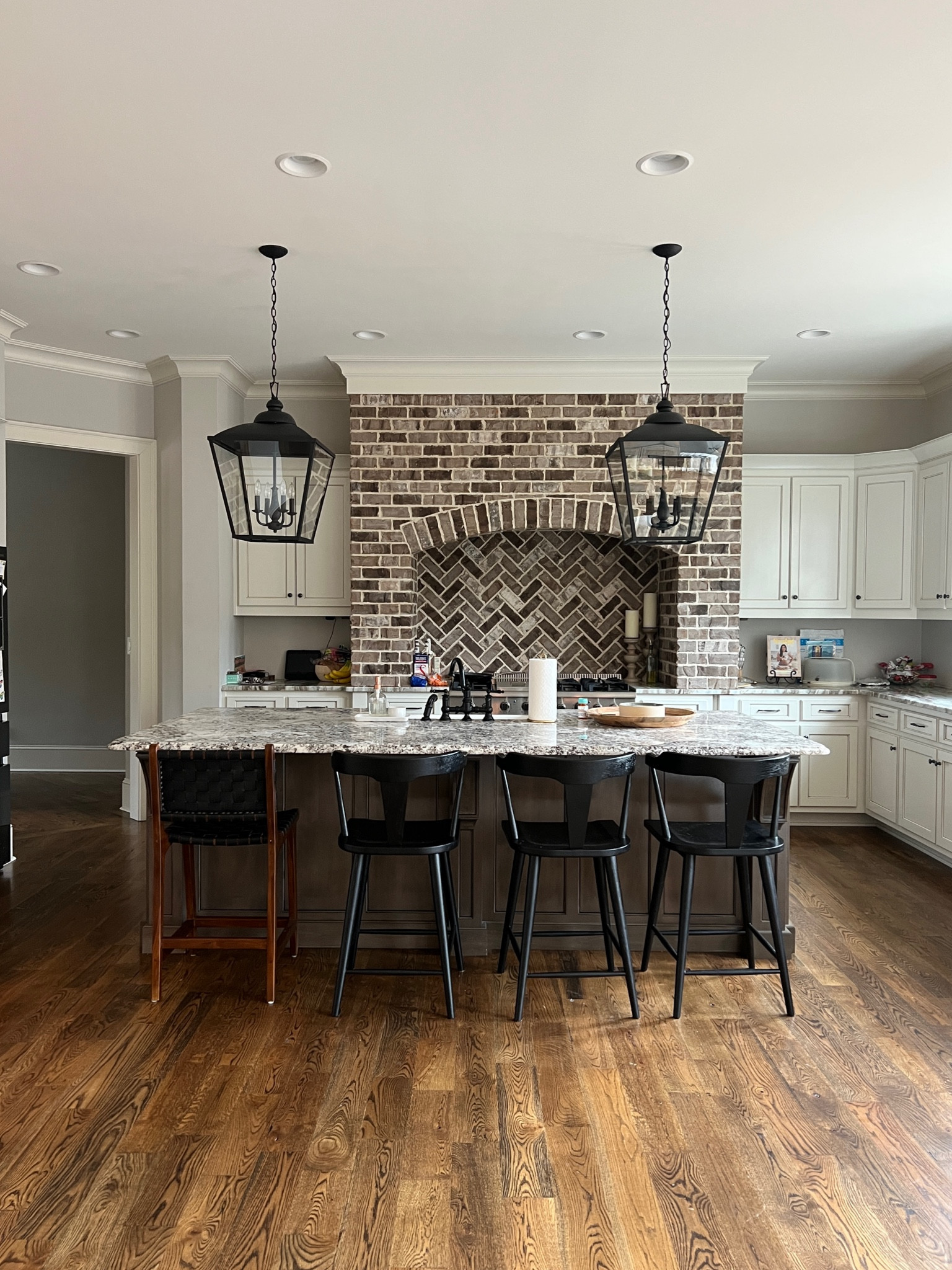 New counter chairs! Keeping the wood ones. 😍 so so pretty. Real wood and very durable. Comfy to sit in too! Kitchen island stools chairs lantern kitchen pendant lights lighting fixture traditional modern decor 

#LTKhome #LTKstyletip