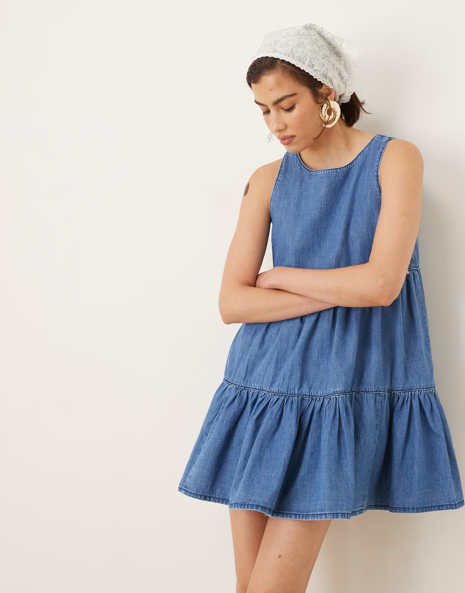 ASOS DESIGN denim tiered mini dress in midwash blue | ASOS (Global)