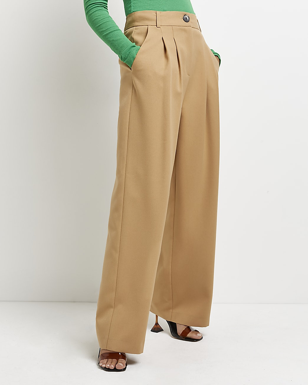 Beige pleated wide leg trousers | River Island (UK & IE)