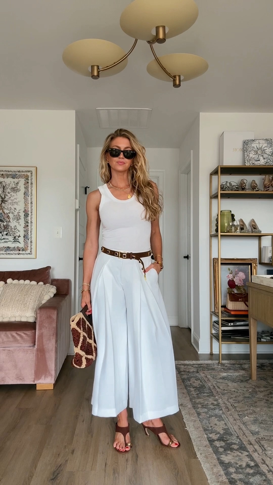 A summery white look. 

White tank: TTS, wearing a S
Crepette pants: TTS, wearing 2
Suede brown heels: TTS

#LTKootd #LTKgrwm #LTKdayinmylife