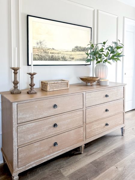 Dresser is awesome quality! Artwork is actually our frame TV!

Dresser, wide dresser, bedroom, artwork, frame tv, tv set, table decor, home decor, vase, faux greenery, decorative bowl 

#LTKfindsunder50 #LTKhome #LTKsalealert