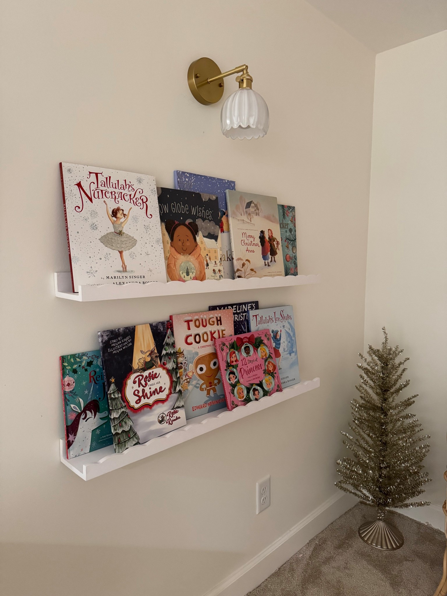 Scallop book shelves
Battery operated sconce 
Christmas shelves for little girls room

Shelves
Scallop shelves
Battery sconce 
Girls room decor 
Nursery book shelves 

#LTKKids #LTKHoliday #LTKFindsUnder50