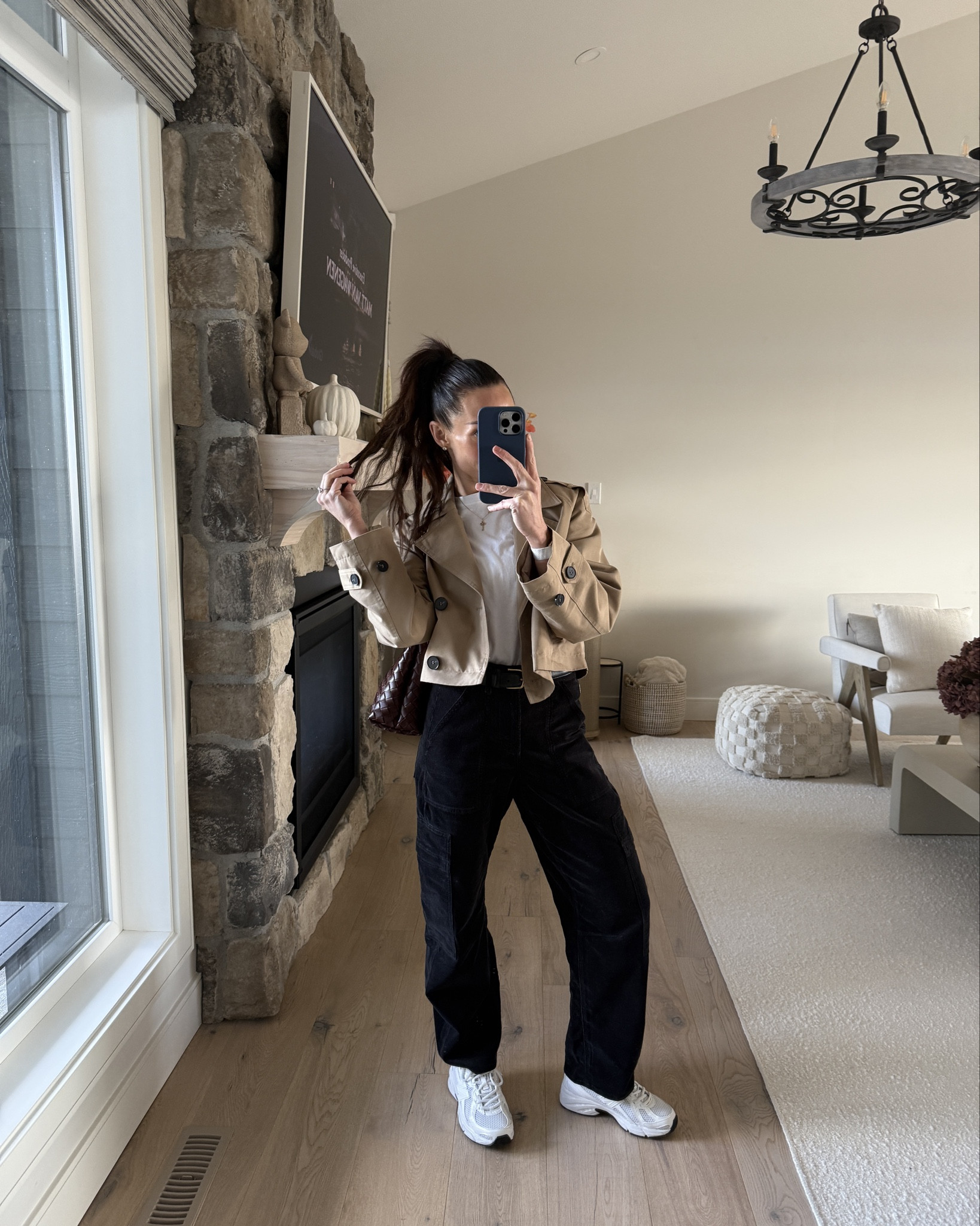 Cropped trench and afternoon casual fall outfit. This cropped trench is a fall staple that instantly elevates any outfit 🤎

Wearing size XS in the cropped trench, 23 in the pants and SM white t-shirt.

I included a few other cropped trench coats incase it’s sold out! 

#LTKShoeCrush #LTKItBag #LTKStyleTip